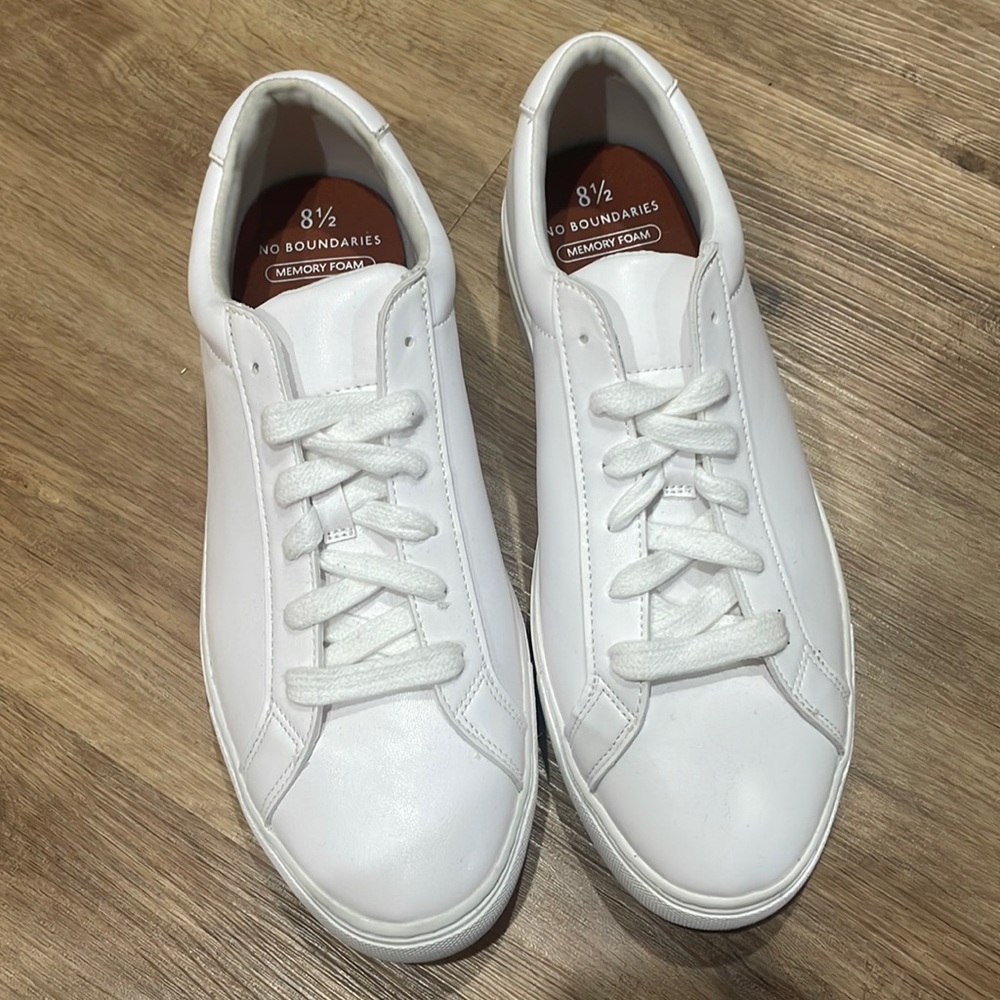 Solid white sneakers